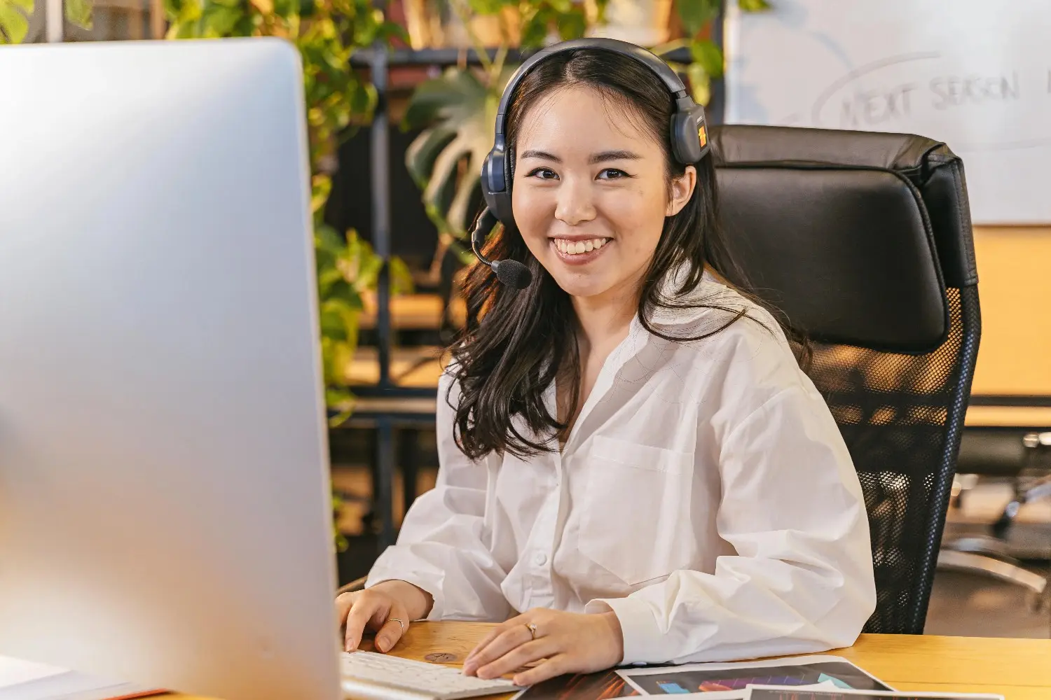 Neura customer support specialist working at a desk